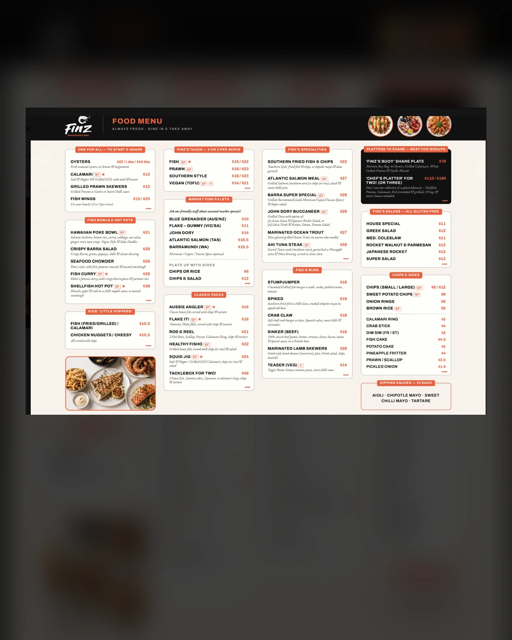 Finz Seafood Bar & Grill printed menu displayed on a restaurant table